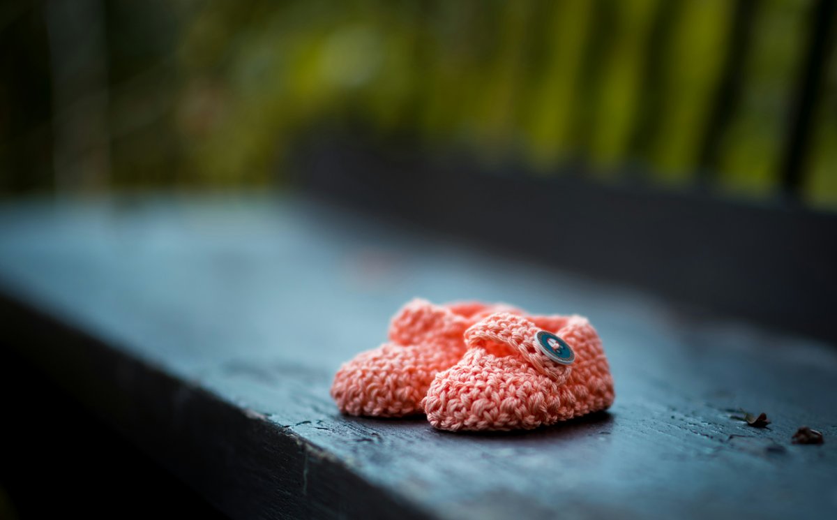 A small knitted heart representing thoughtful fertility care